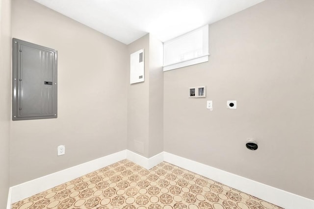 laundry room with hookup for a washing machine, laundry area, baseboards, electric panel, and electric dryer hookup