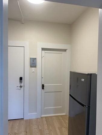 1258 Commonwealth Ave Unit 8, Boston, MA 02134 - doorway with light wood-style flooring