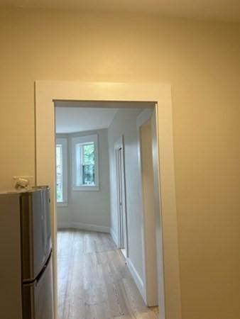 1258 Commonwealth Ave Unit 8, Boston, MA 02134 - hall featuring light wood-style floors and baseboards