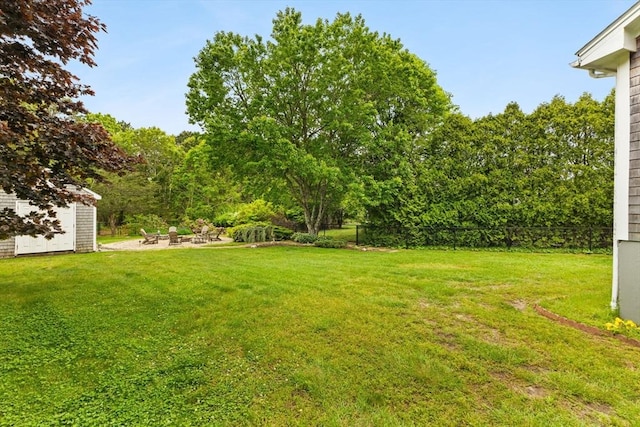 8 Stackpole Cir, Bourne, MA 02532 - view of yard with an outdoor fire pit and a patio