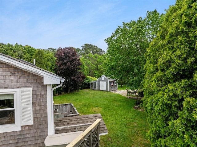 8 Stackpole Cir, Bourne, MA 02532 - view of green lawn with an outbuilding