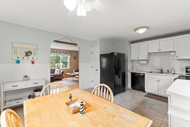8 Stackpole Cir, Bourne, MA 02532 - dining room with ceiling fan and a wainscoted wall