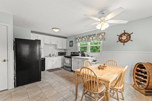 8 Stackpole Cir, Bourne, MA 02532 - kitchen with black appliances, a sink, ceiling fan, white cabinetry, and light countertops