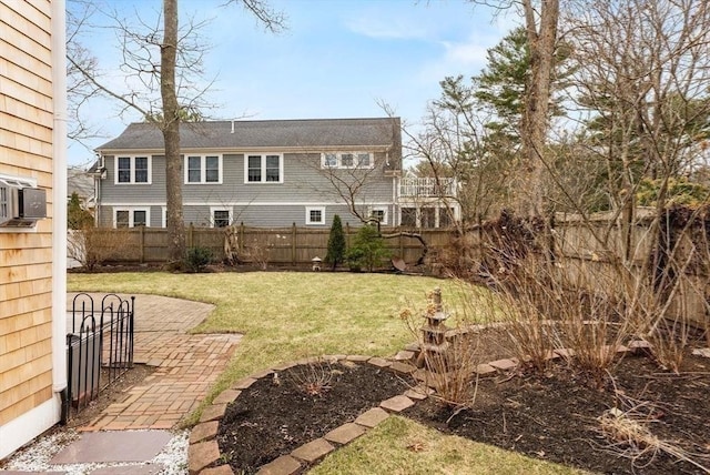 view of yard featuring a fenced backyard and a patio