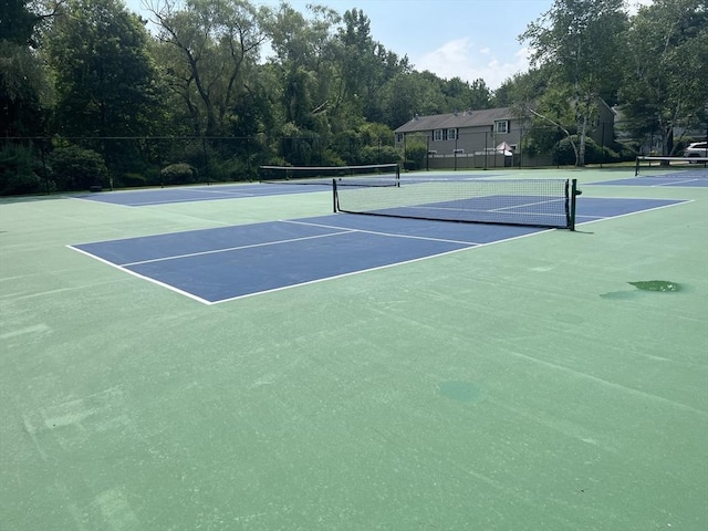 view of sport court with community basketball court and fence