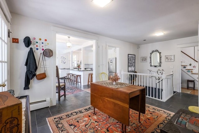 dining space featuring a baseboard radiator