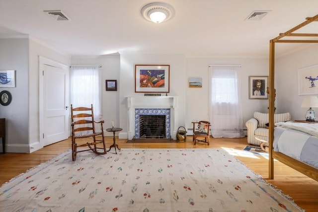 interior space featuring crown molding and hardwood / wood-style floors