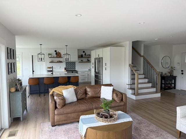 LOT1 Jeffrey Ln, West Bridgewater, MA 02379 - living area with light wood-style floors, stairs, and recessed lighting