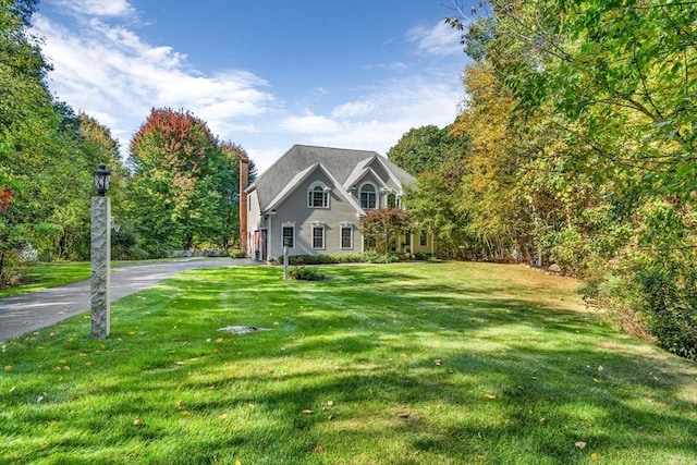 14 Glen Rd, Hopkinton, MA 01748 - view of front of house featuring driveway and a front lawn