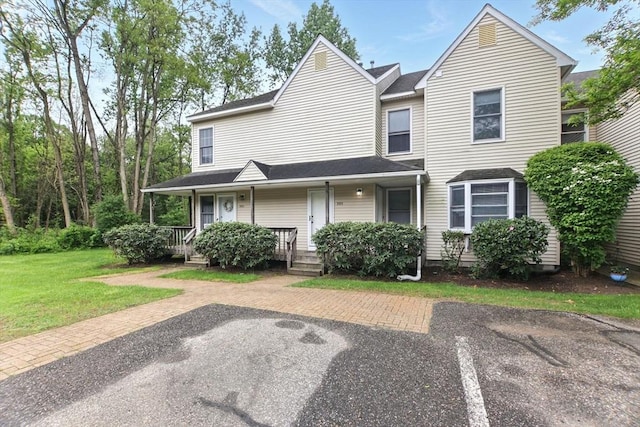 59 Castlegate Dr Unit B, Springfield, MA 01129 - townhome / multi-family property with covered porch and a front yard