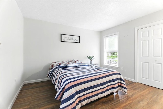 59 Castlegate Dr Unit B, Springfield, MA 01129 - bedroom with wood finished floors, baseboards, and a textured ceiling