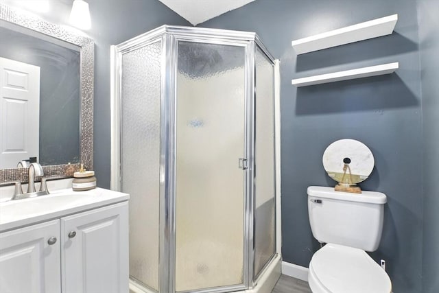 59 Castlegate Dr Unit B, Springfield, MA 01129 - full bathroom featuring toilet, vanity, and a shower stall