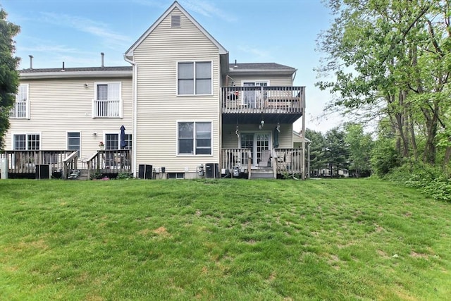 59 Castlegate Dr Unit B, Springfield, MA 01129 - rear view of house with cooling unit, a lawn, a deck, and a balcony