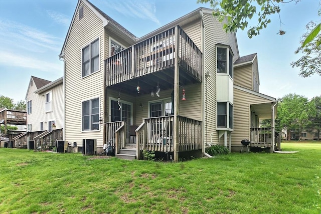 59 Castlegate Dr Unit B, Springfield, MA 01129 - back of property featuring a lawn
