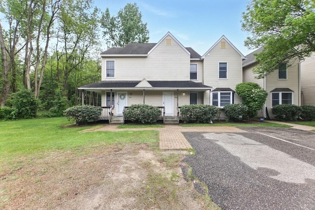 59 Castlegate Dr Unit B, Springfield, MA 01129 - view of front of home featuring a front yard and a porch