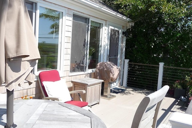 view of patio / terrace featuring area for grilling and a wooden deck