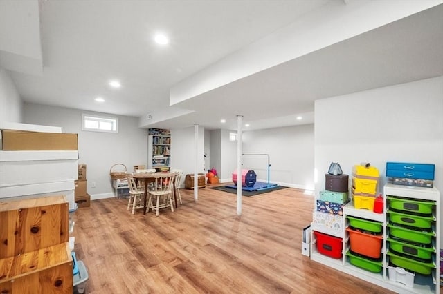 playroom featuring recessed lighting, baseboards, and wood finished floors