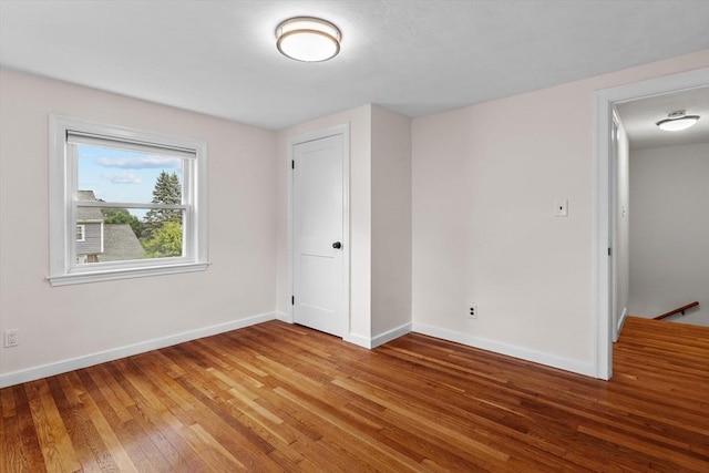 10 Highfield Ter, Boston, MA 02131 - unfurnished bedroom featuring light wood-type flooring and baseboards