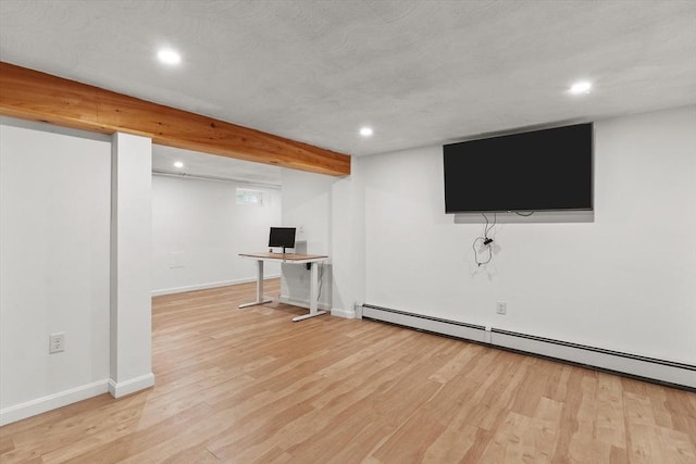 10 Highfield Ter, Boston, MA 02131 - finished below grade area with a baseboard heating unit, recessed lighting, wood finished floors, and an office area