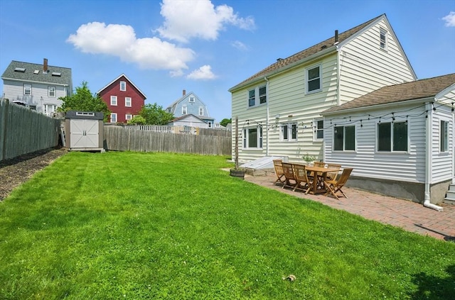 10 Highfield Ter, Boston, MA 02131 - fenced backyard featuring a shed and a patio