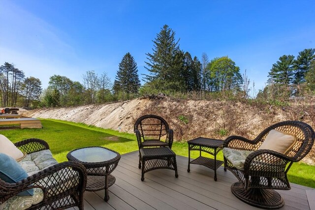 deck featuring a yard