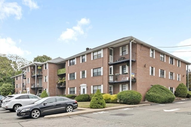 360 Neponset St Unit 503, Canton, MA 02021 - view of apartment building / complex featuring uncovered parking