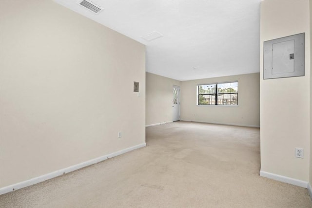 360 Neponset St Unit 503, Canton, MA 02021 - empty room featuring electric panel, light carpet, and baseboards