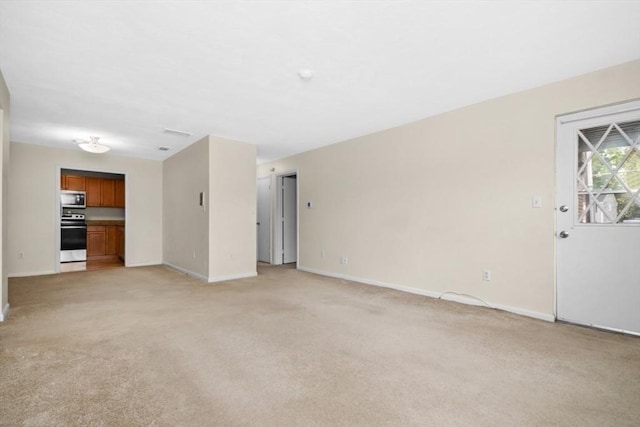 360 Neponset St Unit 503, Canton, MA 02021 - unfurnished living room featuring light colored carpet and baseboards