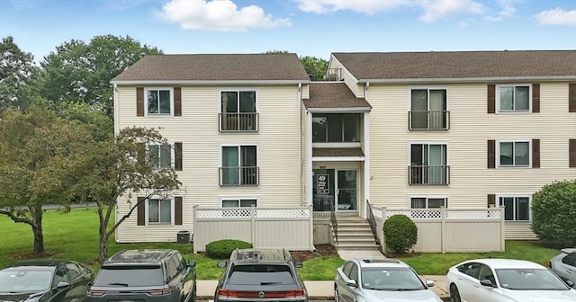 49 Village Brook Ln Unit 2, Natick, MA 01760 - view of property featuring uncovered parking