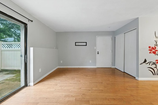49 Village Brook Ln Unit 2, Natick, MA 01760 - unfurnished room featuring light wood finished floors and baseboards