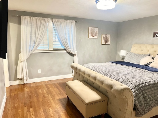 bedroom featuring hardwood / wood-style flooring