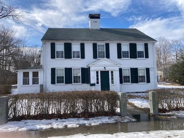 colonial house with a chimney