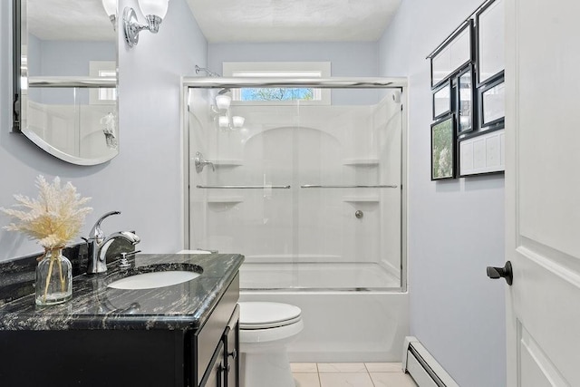 full bathroom featuring tile patterned flooring, vanity, toilet, a baseboard radiator, and combined bath / shower with glass door