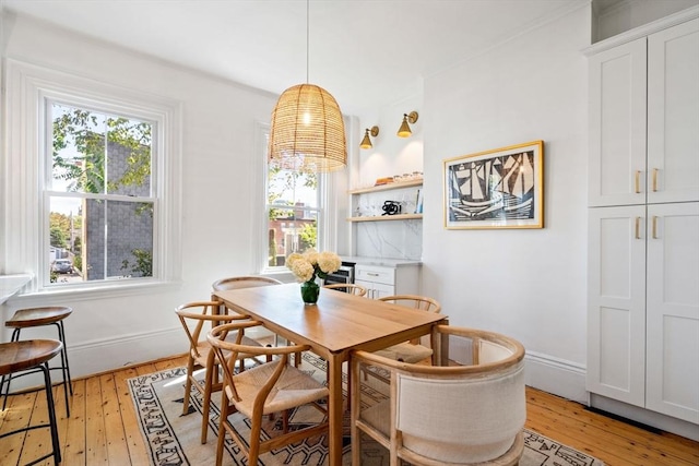 dining room featuring light hardwood / wood-style flooring