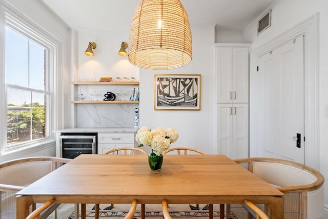 dining space featuring wine cooler