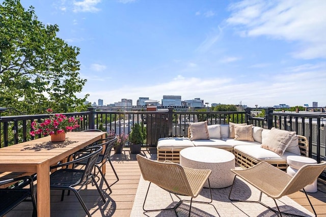 wooden deck with an outdoor hangout area