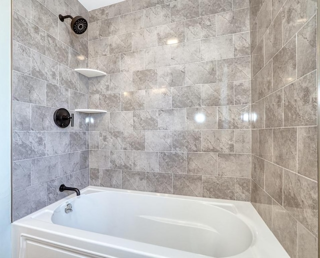 bathroom featuring washtub / shower combination