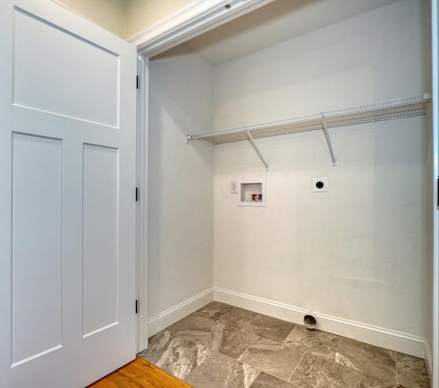 laundry area featuring laundry area, hookup for a washing machine, baseboards, and hookup for an electric dryer