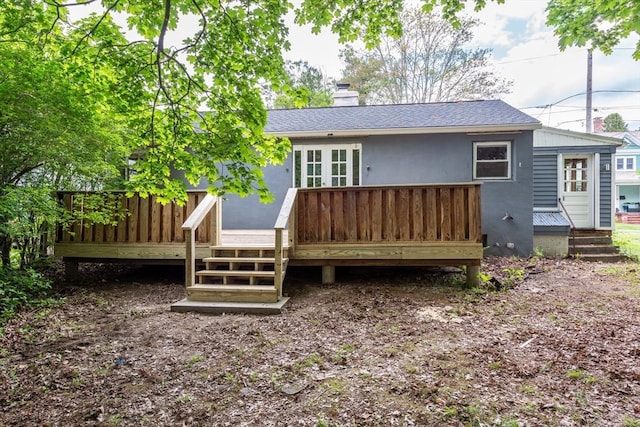 22 Sherman Ave, Northampton, MA 01060 - rear view of house with a chimney, a deck, and a shingled roof