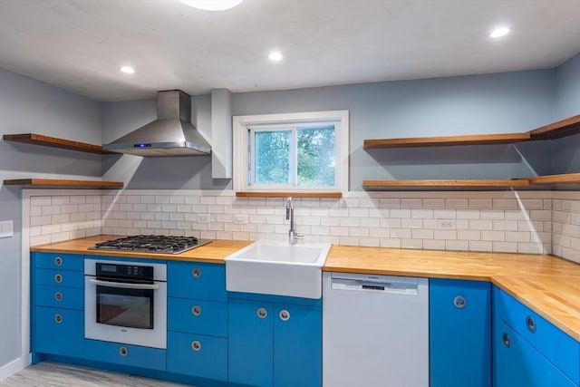 22 Sherman Ave, Northampton, MA 01060 - kitchen with open shelves, appliances with stainless steel finishes, wooden counters, wall chimney exhaust hood, and recessed lighting