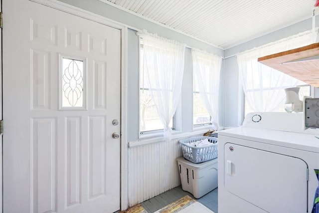 washroom featuring washer / clothes dryer and laundry area