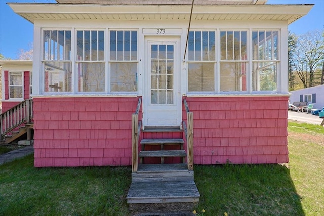 exterior space with a lawn