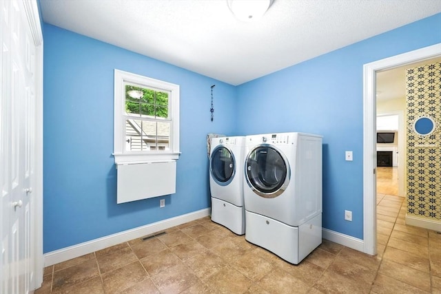 10 Tigger Ln, South Hadley, MA 01075 - laundry area with washing machine and dryer and baseboards