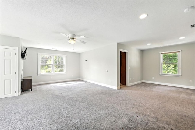 10 Tigger Ln, South Hadley, MA 01075 - unfurnished living room featuring a ceiling fan, carpet, recessed lighting, and a textured ceiling