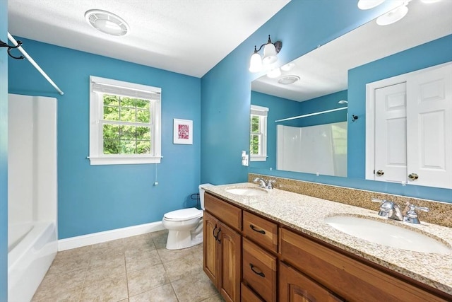10 Tigger Ln, South Hadley, MA 01075 - bathroom with double vanity, plenty of natural light, bathing tub / shower combination, and tile patterned flooring