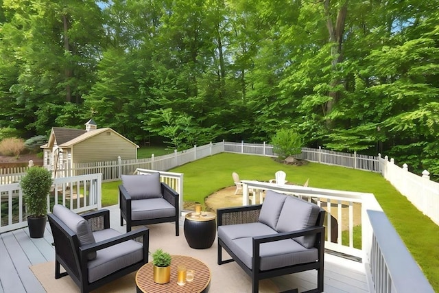 10 Tigger Ln, South Hadley, MA 01075 - wooden terrace featuring a fenced backyard, an outdoor hangout area, and an outdoor structure