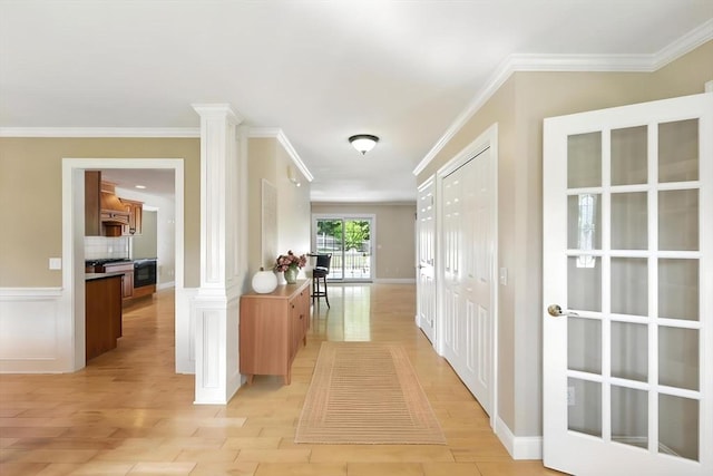 10 Tigger Ln, South Hadley, MA 01075 - hall with ornate columns, ornamental molding, and light wood-type flooring