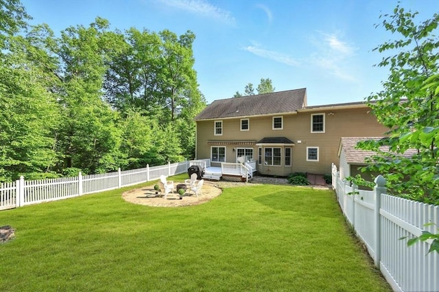 10 Tigger Ln, South Hadley, MA 01075 - back of house with a deck and a fenced backyard