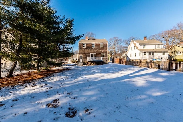 view of yard covered in snow