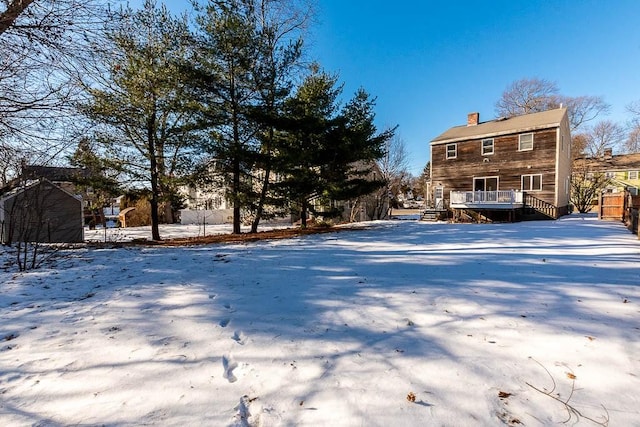 view of snow covered property